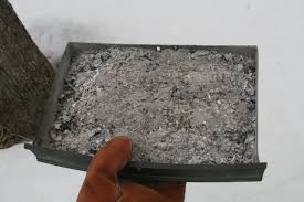 Coal or charcoal ash